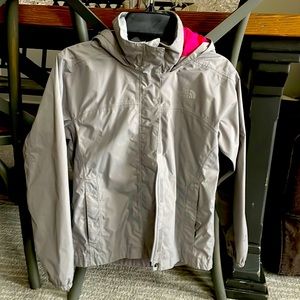 Light gray north face jacket.